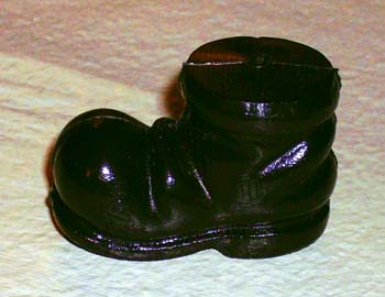 Nissestøvler mini - sort plastic 4,3 lx1,7bx3