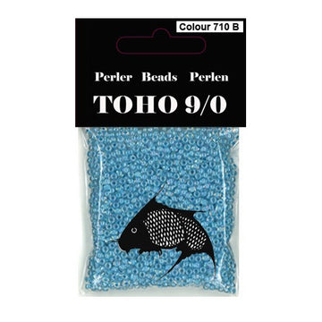 TOHO perler 9/0 farvenr 710B blå farvet kerne klar udenom. 40g
