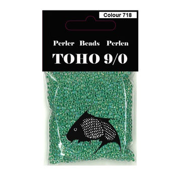 TOHO perler 9/0 farvenr 718 grøn kerne klar udenom. 40g